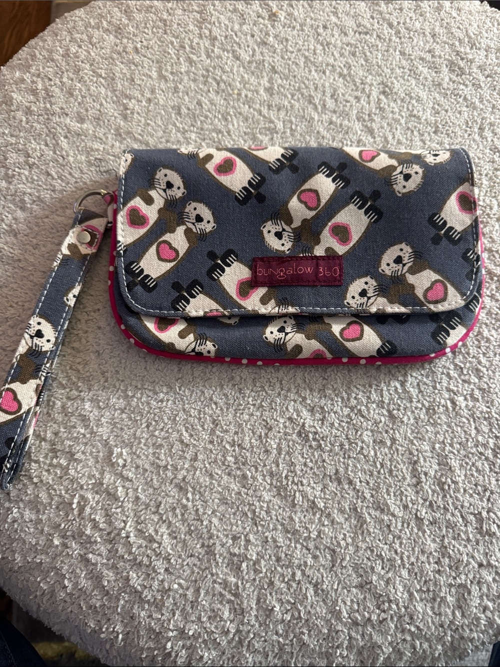 Bungalow 360 gray fabric otter print zipper & snap flap closure wristlet. New.